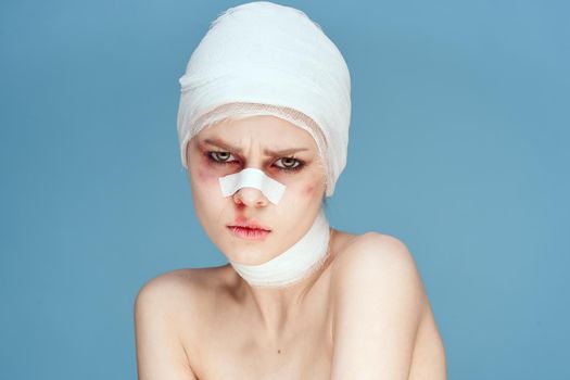 portrait of a woman bruised face medicine treatment injury isolated background. High quality photo