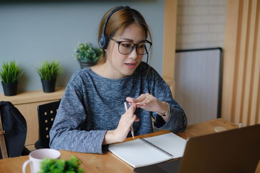 Student learning at home with online lesson by laptop computer. E-learning ,online ,education and internet social distancing protect from COVID-19 viruses concept