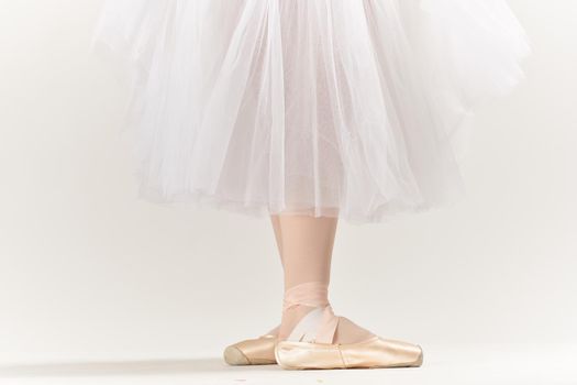 ballerina feet elegant style art balance artist light background. High quality photo