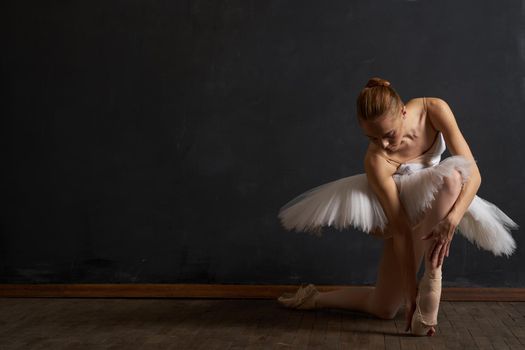 woman ballerina in white tutu performance grace dance. High quality photo