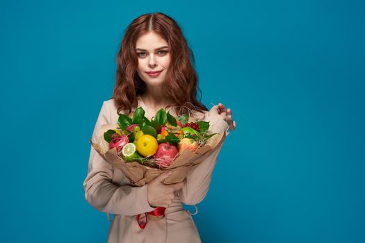 beautiful woman smile posing fruit bouquet vitamins colorful background. High quality photo