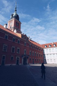 Girl walking in the Royal Castle in the Old town - Warsaw - Poland.