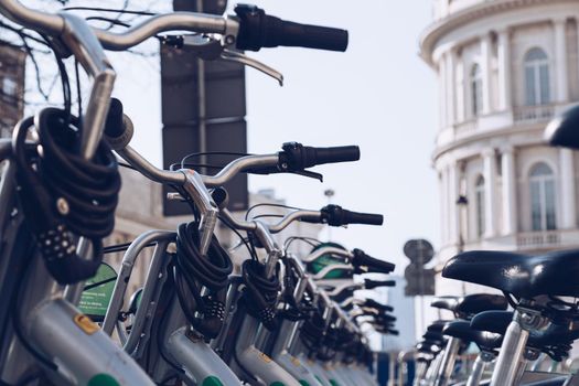 WARSAW, POLAND - March 2018 - Group of rental bikes standing in center city of Warsaw