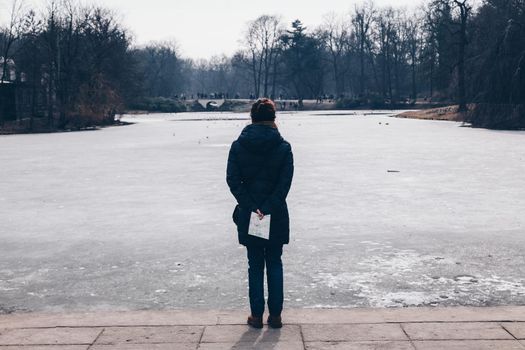 Warsaw Poland - March 2018 tourist looking the ice lake of Warsaw