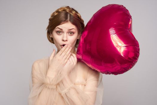 beautiful woman balloon heart gift fashion holiday. High quality photo