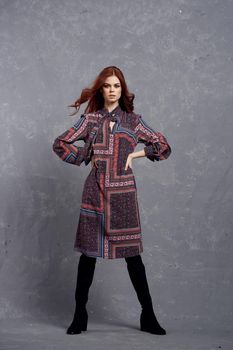 woman in coat posing fashion clothing full length. High quality photo