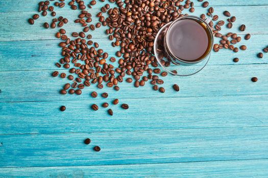 coffee beans Hot drink spilled grains photograph of the object. High quality photo