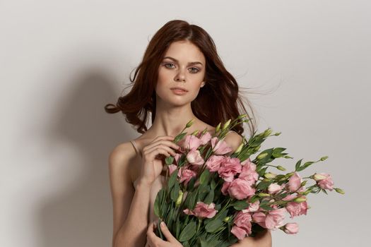 attractive woman pink flower bouquet fashion summer Studio Model. High quality photo