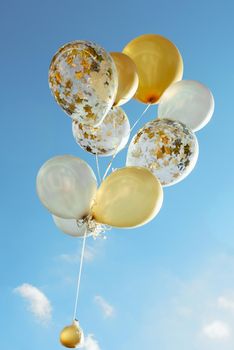 party balloons white yellow blue sky events 