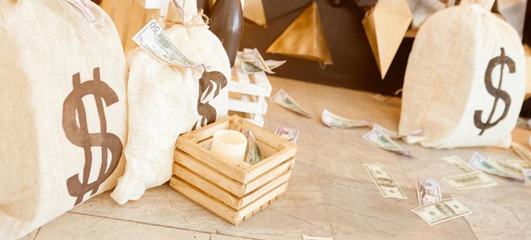 Big Bag Of Money on ground with wood box and future background. High quality banner