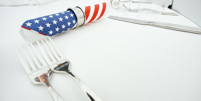 Served table with American topic decorated by American flag napkin . High quality photo