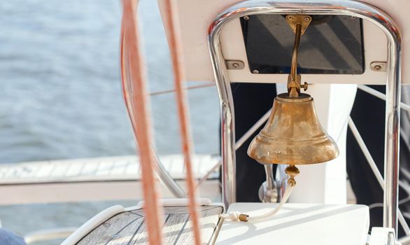 Yachting. Bell on sailing ship. Detail of a yacht boat. High quality photo