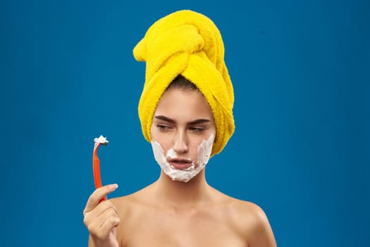 cheerful woman razor in hand skin care hygiene Lifestyle. High quality photo