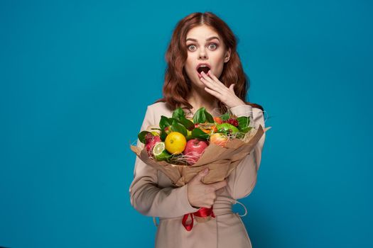 beautiful woman smile posing fruit bouquet vitamins colorful background. High quality photo