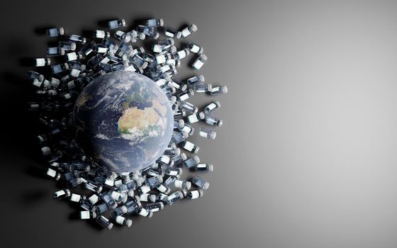 planet earth over many canisters of coronavirus vaccine with a gray background and space for text.