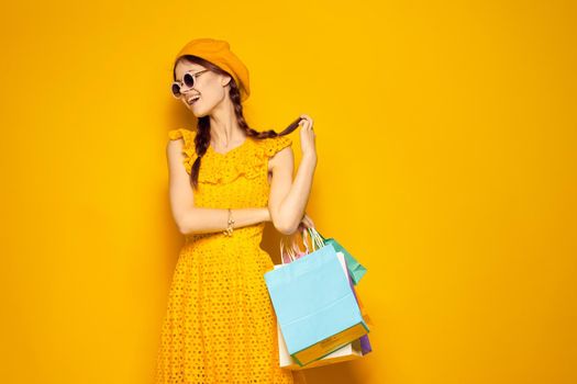 smiling woman wearing sunglasses posing shopping fashion isolated background. High quality photo