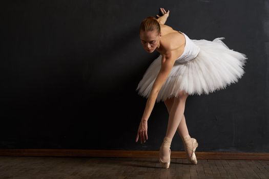 ballerina dance performance classic dark background tradition. High quality photo