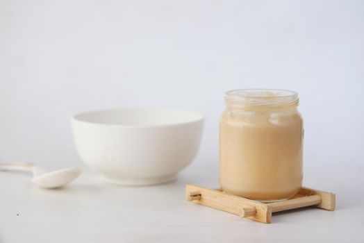 baby food in a container on table with copy space