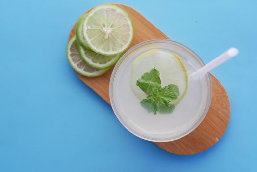 top view of fresh lime juice on table .