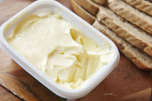 cutting butter on chopping board