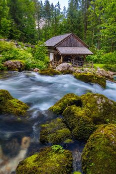 The Gollinger Mill at the Gollinger Waterfall in Golling, Salzburg, Austria. An old water mill near Gollinger waterfall south of Salzburg. 