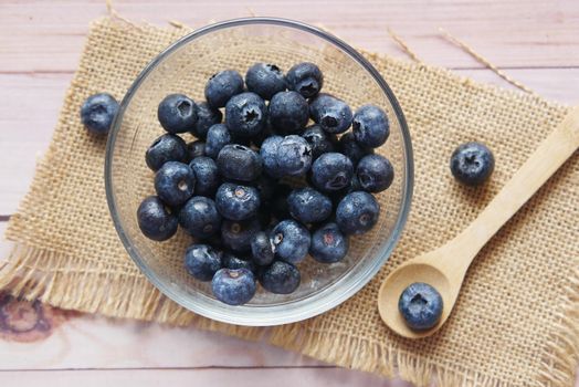 Close up of fresh blue berry with water drops