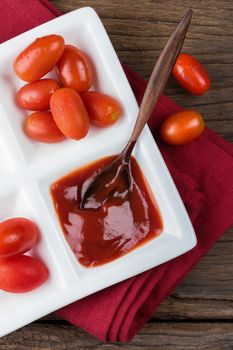 closeup details of ketchup and tomatoes