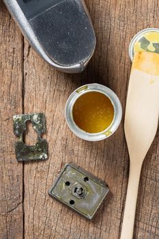 closeup rubber adhesive on wooden desk