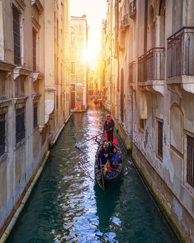 Canal with gondolas in Venice, Italy. Architecture and landmarks of Venice. Venice postcard with Venice gondolas.