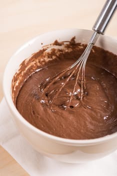 mixing brownie's ingredients in the bowl