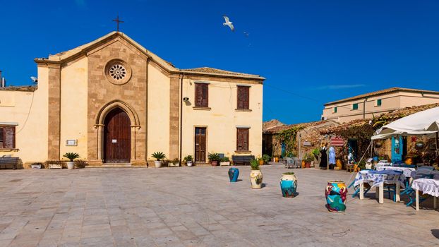 The picturesque village of Marzamemi, in the province of Syracuse, Sicily. Square of Marzamemi, a small fishing village, Siracusa province, Sicily, italy, Europe. 