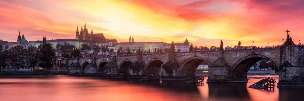 Charles Bridge at sunset with colorful sky, Prague, Czech Republic. Prague old town and iconic Charles bridge and Castle, Czech Republic. Charles Bridge (Karluv Most), Old Town Tower and Castle.