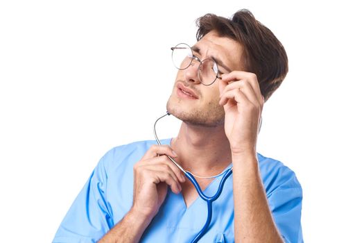 man in medical uniform health care treatment stethoscope examination isolated background. High quality photo
