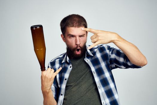 bearded man alcoholism problems emotions depression light background. High quality photo