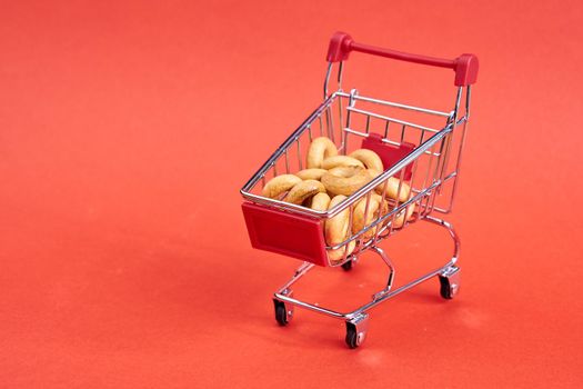 grocery cart red background supermarket isolated background. High quality photo