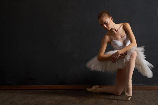 ballerina dance performance classic dark background tradition. High quality photo