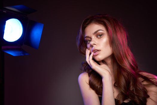 sexy woman attractive look model photography studio spotlight dark background. High quality photo