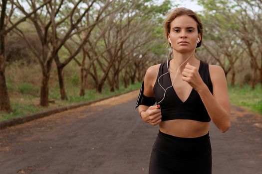 beautiful girl go in for sports. autumn. bali