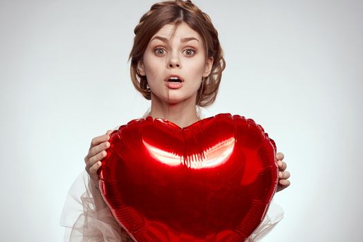 beautiful woman balloon heart gift fashion holiday. High quality photo