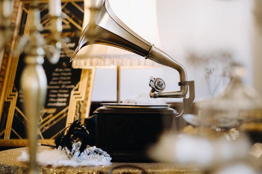 An old retro gramophone is playing a record.