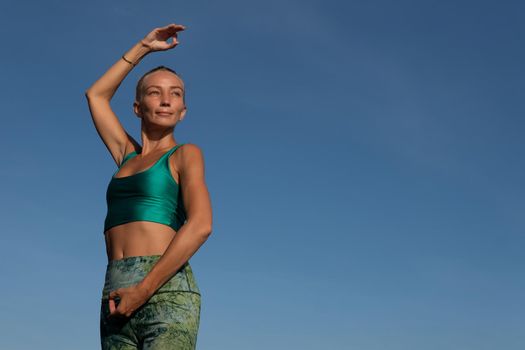 beautiful woman doing yoga on the beach. Bali