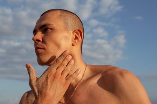 a man checks his pulse after training. bali