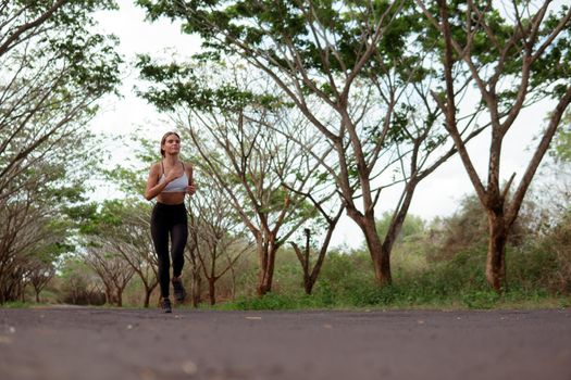 beautiful girl runs into the autumn. bali