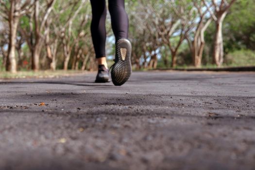 close-up of running black shoes. bali forest