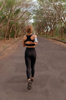 beautiful girl go in for sports. autumn. bali