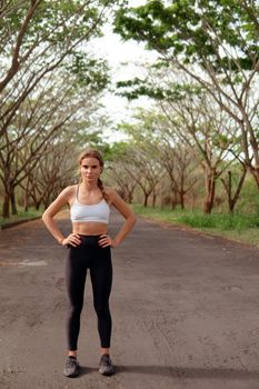 woman warm up in the park. bali