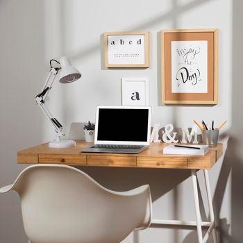 nice organised workspace with lamp. High resolution photo
