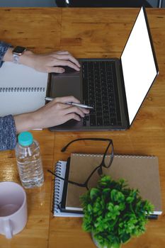 A female investment consultant examines the yearly financial report of a corporation. Stock market, office, tax concept