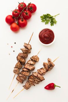 top view delicious kebab with tomatoes ketchup. High resolution photo