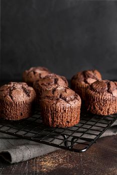 high angle chocolate muffins cooling rack with copy space. High resolution photo